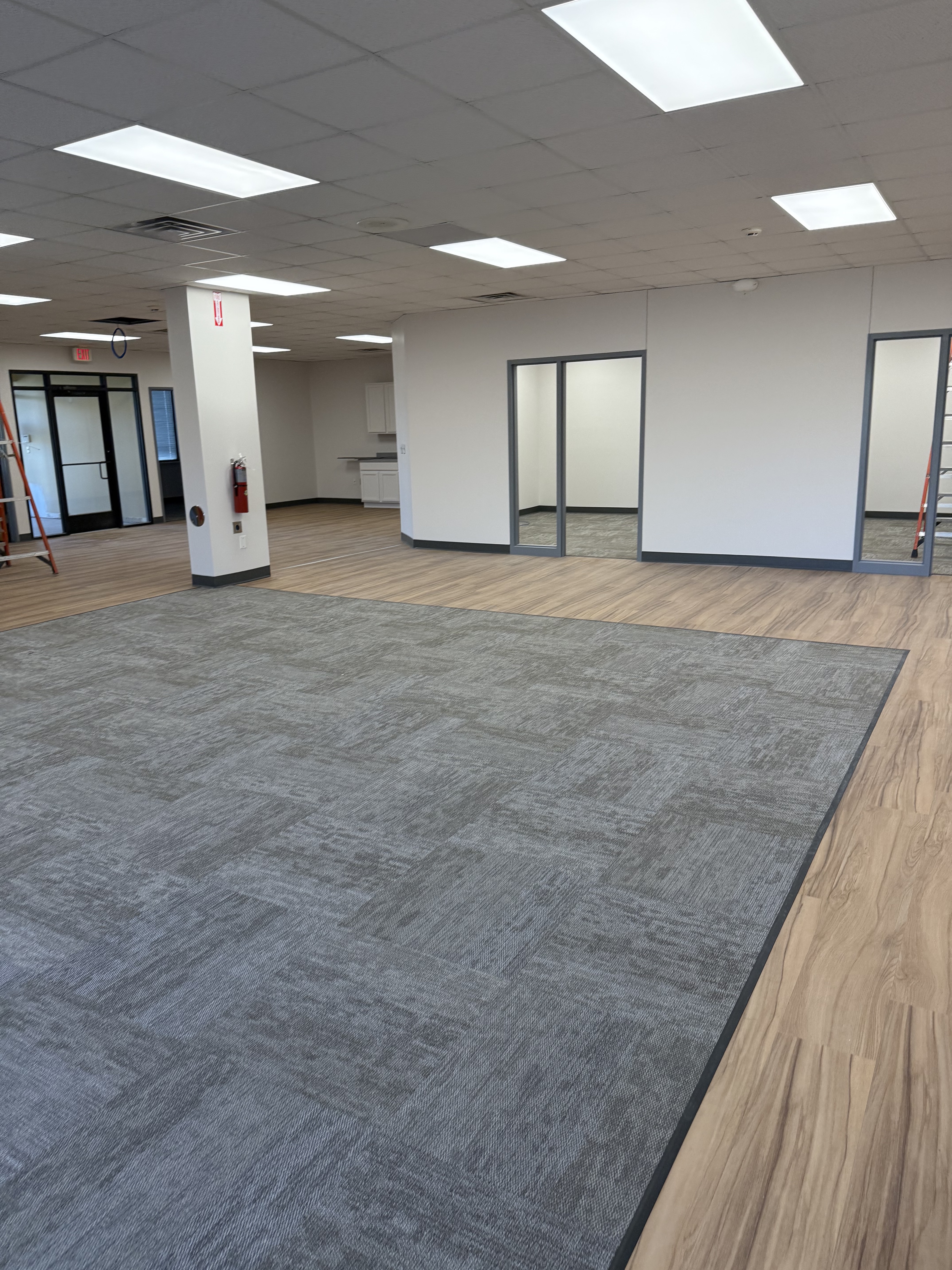 Commercial office flooring with carpet tile and resilient flooring