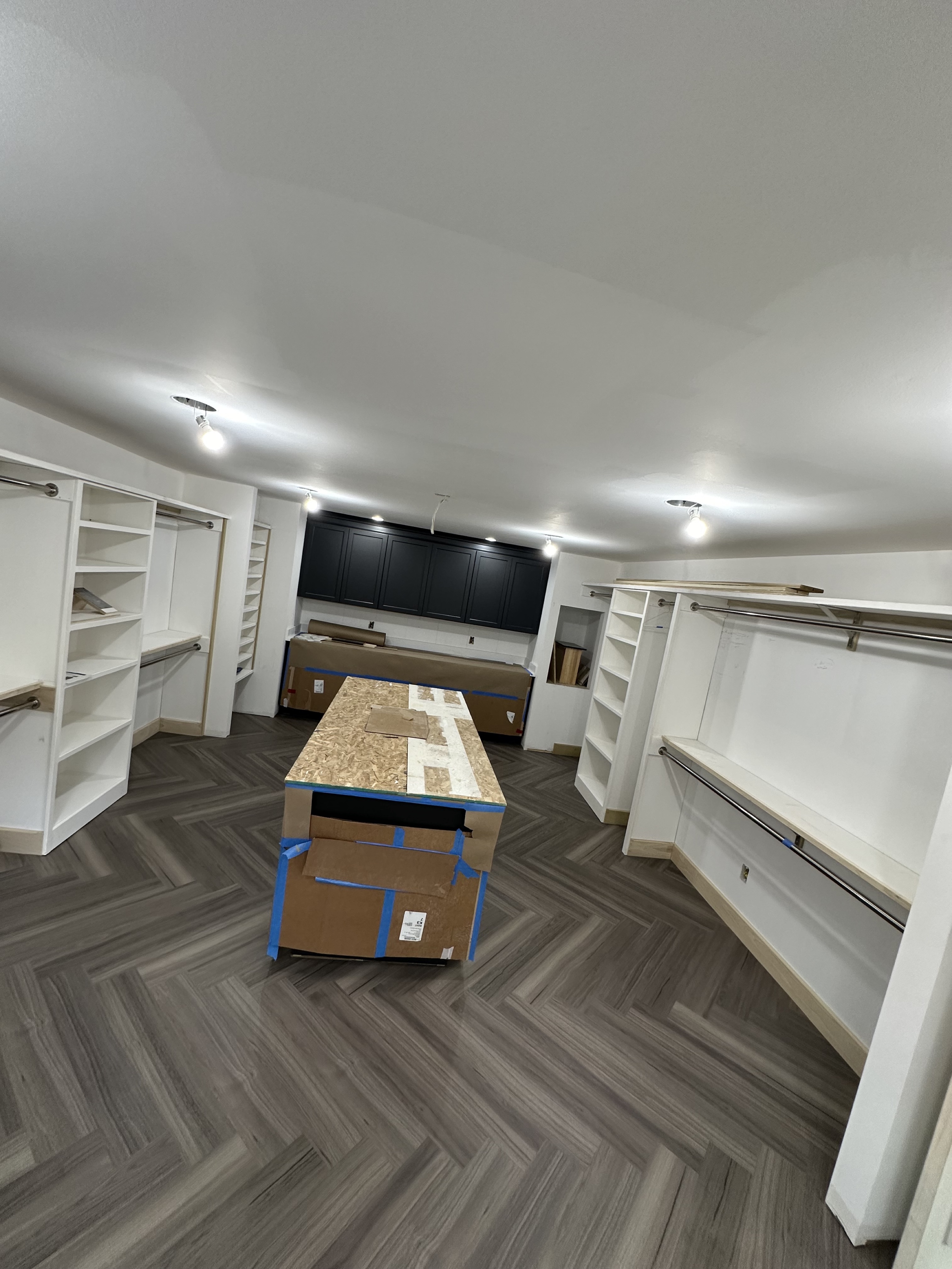 Herringbone flooring in custom closet